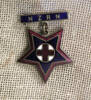 badge [1996.23.1.2]