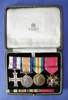 WW1 medal set to Capt. ANH Whitcombe MC, Royal Field Artillery - in case [2003.16.1]