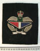 cloth pocket badge - ruler view [2003.88.24] RAF Air Gunner Brevet, JN Kirk, RNZAF, WW2