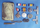 badges and medals and Princess Mary gift tin of Pte WS Thompson, 1NZEF, WW1 [2007.13.1-.9]