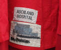 red nursing cape, Auckland Hospital, 1980s [2007.36.2] label detail