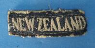 NEW ZEALAND shoulder title, worn by Gunner EA (Ted) Frost, WW2 [2007.78.23] - front view