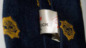 Auckland Harbour Bridge souvenir tie [2007.88.3] - label