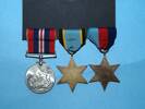 WW2 Campaign Medals, Brian Rogers 75 Sq. - reverse view [2008.14.1-.3]