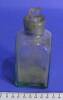 Green/clear glass bottle with glass stopper and wide neck, empty, part of medicine chest [col.0013]