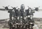F/O Porteous is third from the left in the front row with his crew and their Mark 1 Lancaster