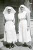 two nurses outdorrs in uniform