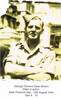 Photo of George on active service. The location and timing  of the photo isn&#39;t known although it may have been in Italy (based on the architecture of the damaged buildings behind). George was my great uncle.