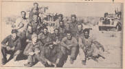From Mr Y HUTCHINSON - we have this picture of some of the first troops of the 8th Army to enter Tunisia.  In it are three Gisborne men.  At Left, in the back row, is Mr (Edward Y M) HUTCHINSON.  In front, in the "lemon squeezer", is Peter Mitford and to the left of him, in the balaclava, Derek PARKER.  The picture was taken on T.I. patrol on the border, on January 12, 1943