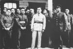 Singing outside the wharenui. C Company March 1940Left to right:  Eruera Dennis Hamon, L/Cpl Kawa Kaa, Harry Mackey, Darkie Leach, Cpl Nopera (Noble) Te Kawa, Herewini Gage, Watene Pahau, 2/Lt Jack Ready (in white), Sgt Albert Wanoa, 2/Lt Peter Awatere, 2/Lt Arnold Reedy, Pat Priestly.