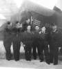 Crew in front of their Stirling bomber August 1943. Left to Right, Alf Dance, Ron Charlton, Arnold Fawcett (sitting in fuselage doorway), Ray Stratton, Les Gaskins, Norman Wilson, Tom Lodge.