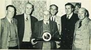 Gisborne members of the Legion of Frontiersmen recently presented Mr W. J. Sinton with a chiming clock in recognition of his 50 years' service to the unit. Pictured with Mr Sinton (centre) are, from left: Messrs Arthur Graham, Walter McGonigal, Joe Cousins, Roy Owen, and Percy Ingram.