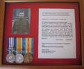 His Photo, citation and medals