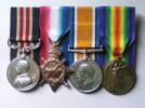Medal set (generic set - not his own) awarded to Gunner Roy Everett for war services (1915-1919).
Left to right: Military Medal for Bravery in the Field (1917); (2)  1914-1915 Star (3) British War Medal and (4) Victory Medal.
Photo reproduced here by kind permission of Mike Smith, Pro Patria (New Zealand). www.patria.homestead.com
