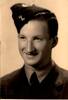 Head and shoulders photo of Frank wearing his air force uniform and hat, which has badges on it. Frank is smiling and looking to the left in the image. This photo was given to my grandmother , a close family friend and neighbour.  