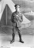 Studio portrait of 1394 Private (Pte) John Frederick Downie, 11th Reinforcements, 4th Light Horse Regiment (4LHR) of Melbourne, Vic (originally of South Dunedin, New Zealand). Pte Downie enlisted on 8 July 1915 and embarked from Melbourne aboard HMAT Palermo on 29 October 1915. He returned to Australia on 15 May 1919 with the 13LHR.