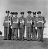 Discovery during Covid holiday - Group. Ohakea Station Band fanfare players at RNZAF Station Ohakea.  
L-R: Robert T F Lewis, Omar Grant, unknown, Jay Neal, Sergeant Rangi Royal, unknown, unknown.
 Ohakea RNZAF music  Copyright:
Crown Copyright 1966, New Zealand Defence Force