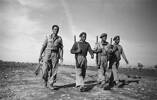 22 Sept 1944 - World War 2 soldiers of the Maori Battalion near Rimini, Italy, 22 September, 1944. From left W Kaipuke (Gisborne), G Rata (King Country), E Haumate (Bay of Plenty), and M Honana (Cape Runaway)