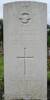 Headstone of RNZAF Pilot Officer Leonard W. Bennett - at Kemble Church Cemetery, Gloucestershire, United Kingdom.
