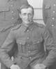 Photo of Edward Pope in uniform and sitting