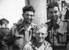Three soldiers from 19 Army Troops, returning to Egypt from Crete, on HMS Phoebe. L to R  Norm Jull, Snowy Close, and Harry Gregory