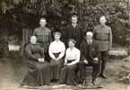 Standing     Willie (William), Davy, and Jim (James).
sitting    Helen, Mary, Nellie, William.