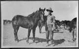 Trooper C L Crowley and a horse named &quot;Bint.&quot;. Field-Dodgson, Ernest Robert, 1926-1999 : World War I photograph albums compiled by trooper C L Crowley. Ref: PA1-o-170-44-1. Alexander Turnbull Library, Wellington, New Zealand. http://natlib.govt.nz/records/23182914

&quot;Trouper C L Crowley of the Canterbury Mounted Rifles (34th Reinforcements) holding a horse named &quot;Bint.&quot; Photographed by an unknown photographer sometime in the first half of 1919.

Inscriptions: Inscribed - Album page - beneath image: Bint.

This photograph was most probably taken while the New Zealand Mounted Rifles was encamped at Rafa in early 1919 or later at Ismailiya Military Camp near the Suez Canal.&quot;