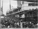 Crowds gather by the ship - either the Tofua or Willochra - both of which departed Wellington NZ on 14 August 1915 transporting the 6th Reinforcements, NZEF - of which Gunner Roy Everett of Nelson, was a member - for overseas war service. The ships would arrive in Egypt 5 weeks later.