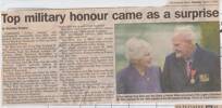D-Day veteran Tony BAIN and wife Diana, a former WREN, are proud of the Legion d'Honneur Mr Bain received for his exploits at the Normandy landings. 