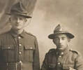 Jonathon Beckett in uniform during service. He is on the R. Man on L unknown.