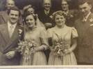 Colin on left hand side of photo marrying Loraine Frances Palmer  9-8-1952,
His Dad directly behind him ,Mother rear far right.