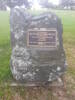 Memorial cairn with plaque