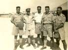 Officers outside Officers' Quarters at Base.:From left to right: Hoani Lawson, George Marsden, Ted Pohio, Bully Jackson and Harry Lambert
