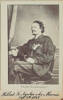 Copy photograph of a studio portrait of Major Gustavus Ferdinand von Tempsky of the Forest Rangers, who was killed at Te Ngutu-o-te-Manu on 7 September 1868. He is seated in profile and is wearing military uniform. One arm is leaning against a small table and he holds an object, possibly a sword or stick, in one hand. The photograph is included on page 6 of William Francis Robert Gordon's album "Some "Soldiers of the Queen" who served in the Maori Wars and Other Notable Persons Connected Herewith".