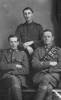 Maurice Murphy standing at back with other Woodville men Jock Hambling seated left and George Broadbent seated right.