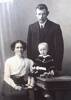 Mother, Caroline Emma Scrimgeour nee Solly and father, David Scrimgeour with little Edna May Scrimgeour born May 21, 1912. Taken by a studio photographer working out of Nelson. Famiy residing in the Collingwood, Takaha region. Edna was the last child born to Caroline Emma and David. David fell ill around the time of the Great Influenza Epidemic post World War 1 and left Caroline Emma a widow with four children to care for.
