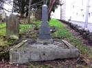 This grave and plot is located in the Symonds Street Cemetery about half-way down and right next to St. Martins Lane.