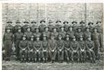 Note on back of photo reads &quot;5th O.S.C.W (?) Army School Trentham 1940.&quot; His record shows that he was posted to Trentham for Office Training Course on 30th August1940 so this must have been taken during this course. J R Baird is second row, 5th from left.
