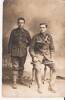 This photo was sent to Frederic&#39;s mother on the back it says  to mother taken in france with friend 1918 . It has been confirmed that the soldier sitting is an English soldier due to his well made boots as the Nz soldiers ones were pretty badly made. Interesting comment