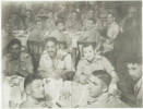 Maadi Camp near cairo, Egypt c. 1943. NZ Troops on rest & recreation following battle at El Alamein. The tokomaru Bay soldiers gathered together for a formal dinner. Front table L-R going round: RalphRisborough. Keith Oates, Jacob RYLAND, Hoe OATES, Henry POTAE, Chino MULLIGAN. Middle Table L-R: Bill CHAFFEY, Jack CONOLE, ?, Bosie McCULLOUGH, Jack BURDETT. Among the remainder are George KERR, Digger JEFFERD, Goldie WHEELER, Hector RODDA, Baldy MORRIS & Jack TANKARD (Minister), all from Tokomaru Bay