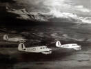 Photo of three aeroplanes flying in formation from the collection of NA Cooper (s/n NZ415966).