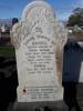 Grave cleaned by Remembrance Army with poppy attached, Anzac Day 2022