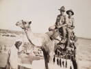 Riding to war on a camel.