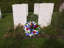 This wreath was laid by Chediston people between Jack Stanley Foden (right) and Thomas Fraser Munro's graves at Ipswich, England.