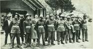 page thumbnail  From Mr H. A. Brown, Te Araroa, comes this old photo of men of the 28th Maori Battalion on final leave before the war. From left, in front, P. Totoro, M. Katae, J. K. Waenga, H. A. Brown, W. Mouranga, T. Korau, R. Campbell and T. Puia. At back - WWI Veterans - R. Hauiti, J. Hazel, R. Bristowe, H. Ruwhiu, A. Apanui, H.Crawford, J. McClutchie, and two unidentified men. The picture was taken in front of the Te Araroa meeting-house and all the men attended the Te Araroa School.