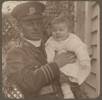 Rev. Mackenzie Gibson holding his grandson Noel Mackenzie Gibson c. 1916
