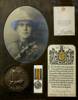 The image was downloaded from an auction site, details of death scroll, medal.