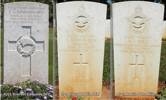 Headstone (far left) of Flt Lt Everest G. Edmunds DFC