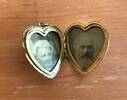 Joe's parents.  Locket made from a gold sovereign.