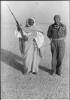 Taken during the Fezzan Raid, January 1941 by Trooper F JoplingCaptain F. Edmundson (right) medical officer with the LRDG and Senussi Chief Sheik Abd el Galil Seif el Nasser. [Alexander Turnbull Library Ref. DA-00871-F].